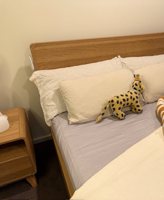 Neutral Grey bed pad for toddlers, sustainable nighttime solution